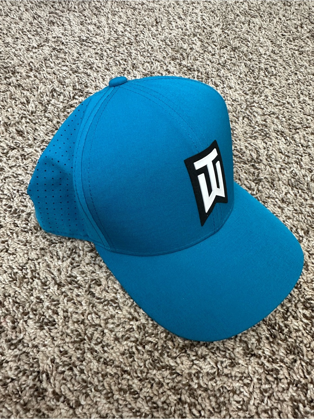 NIKE GOLF TW Tiger Woods Classic Hat featuring perforated panels for airflow.